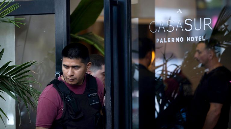 A police officer exits the hotel.
Pic: NurPhoto/Shutterstock