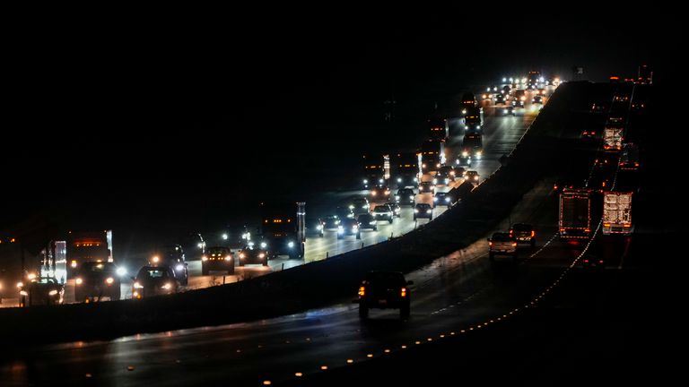 Heavy traffic flows northbound on Interstate-75 as people evacuate the Tampa Bay area ahead of Hurricane Milton's arrival late Monday, Oct. 7, 2024, in Ocala, Fla. (AP Photo/Julio Cortez)