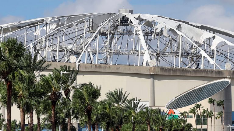 The roof of Tropicana Field was torn off during Hurricane Milton, Thursday, Oct. 10, 2024, in St. Petersburg, Fla. (AP Photo/Mike Carlson)