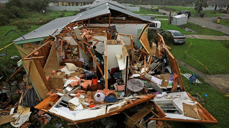 A property damaged after Hurricane Milton made landfall, in Lakewood Park, near Fort Pierce, in St. Lucie County, Florida, U.S., October 10, 2024.  REUTERS/Jose Luis Gonzalez     TPX IMAGES OF THE DAY     