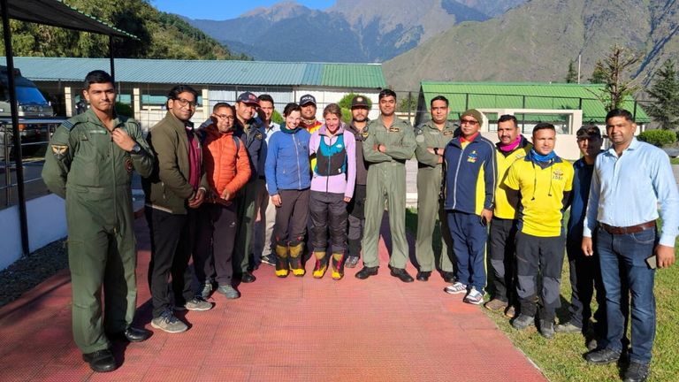 The British and US climbers posing with rescuers in Joshimath, Uttarakhand. Pic: Indian Air Force/Reuters