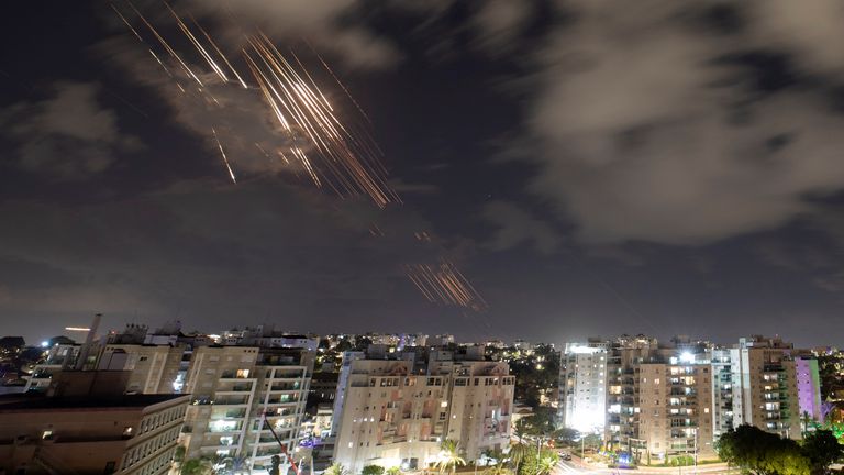 Israel's Iron Dome anti-missile system intercepts rockets, as seen from Ashkelon, Israel. Pic: Reuters