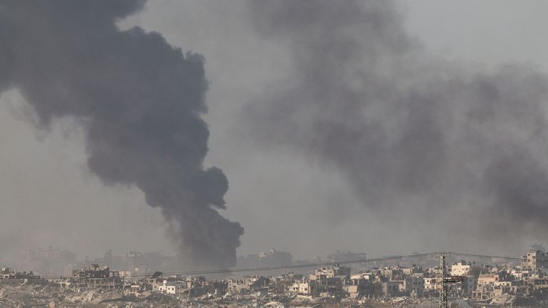 Smoke rises from Gaza as seen from southern Israel. Pic: Reuters