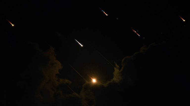 Rockets fly in the sky, amid cross-border hostilities between Hezbollah and Israel, as seen from Tel Aviv, Israel, October 1, 2024. REUTERS/Ammar Awad