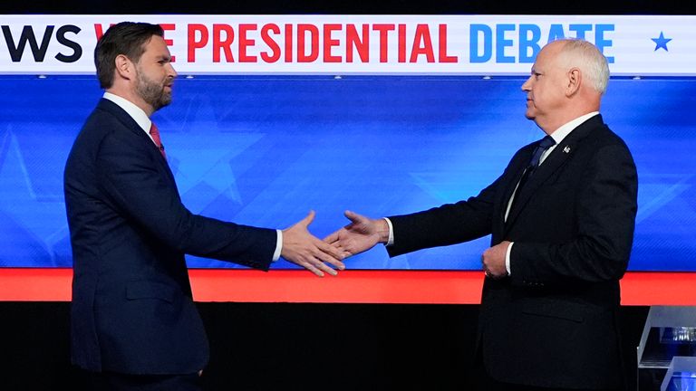 Republican vice presidential nominee JD Vance (L) and Democratic vice presidential nominee Tim Walz, shake hands. Pic: AP Photo/Julia Demaree Nikhinson