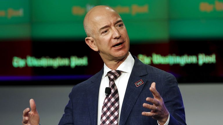 Jeff Bezos, owner of The Washington Post, delivers remarks at the grand opening of the Washington Post newsroom in Washington January 28, 2016. REUTERS/Gary Cameron
