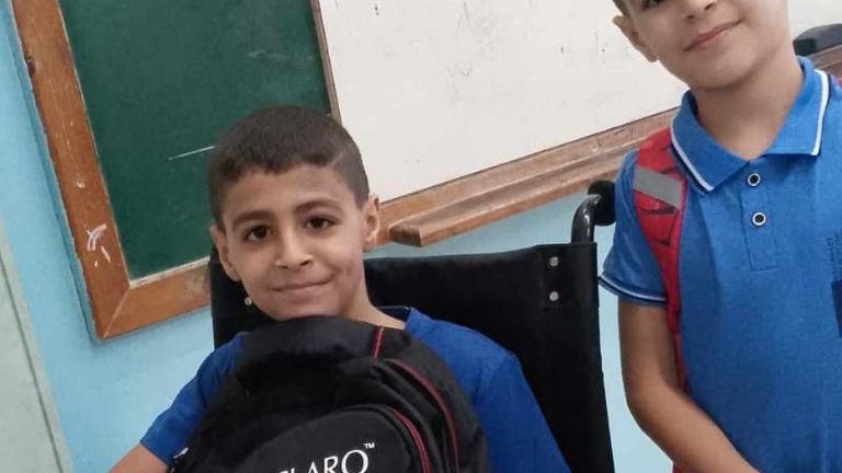 Kareem Sharaab (in wheelchair) was left paralysed from the waist down after being shot by Israeli soldiers in the occupied west bank. Child next to him is his sibling. Pic: supplied by family