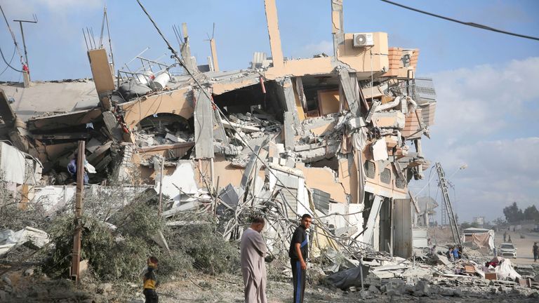 Palestinians inspect the site of Israeli strikes on houses, amid the Israel-Hamas conflict, in Khan Younis.
Pic: Reuters