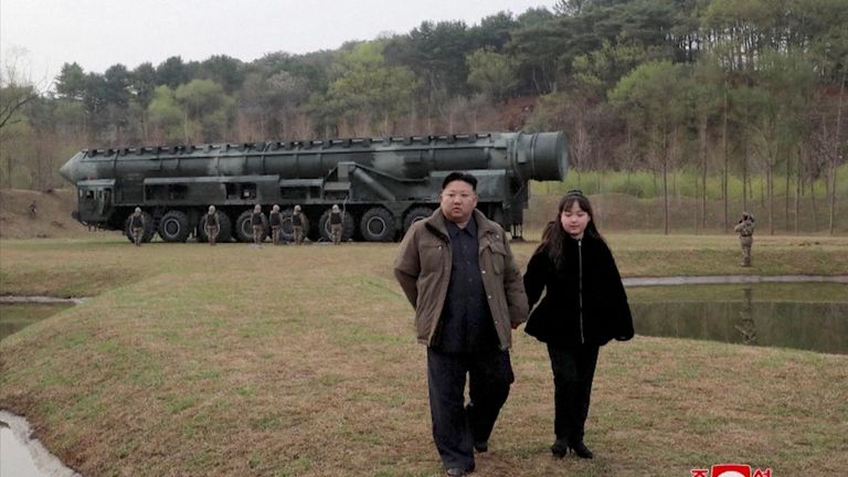 North Korean leader Kim Jong Un and his daughter Kim Ju Ae attend a test launch of a new solid-fuel intercontinental ballistic missile (ICBM) Hwasong-18 at an undisclosed location in this still image of a photo used in a video released by North Korea's Korean Central News Agency (KCNA) April 14, 2023 Credit KCNA