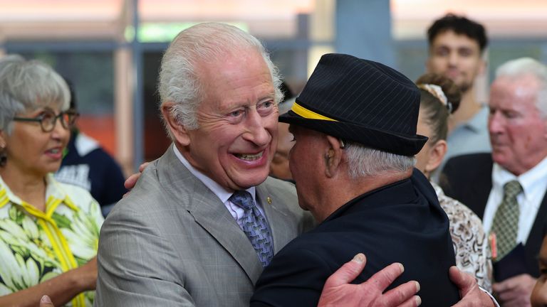 Charles embraces an indigenous community member. Pic: PA