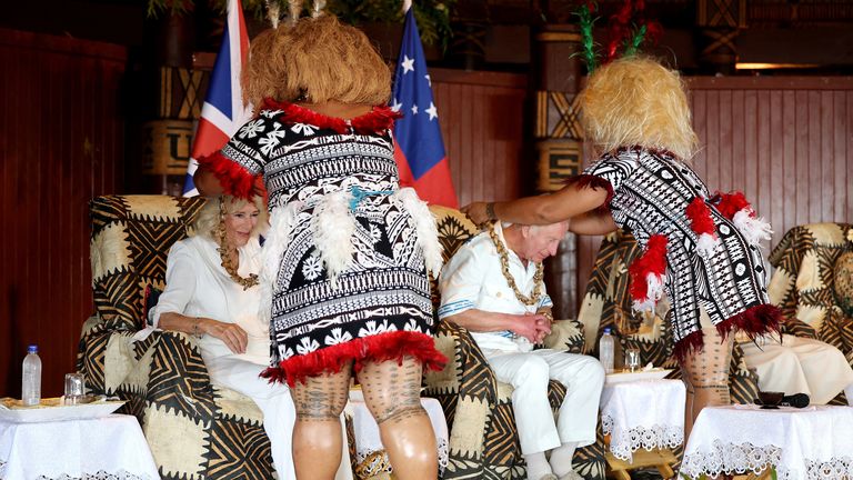 King Charles and Queen Camilla are presented with traditional gifts.
Pic: Reuters