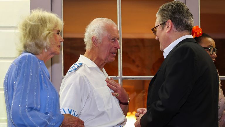 King Charles and Queen Camilla speak to Keir Starmer.
Pic: PA