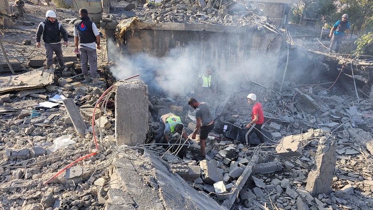 Rescuers work at the site of an Israeli strike in the Bekaa Valley on Wednesday. 
Pic: Reuters