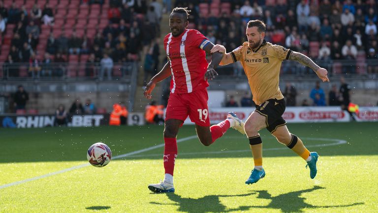 Wrexham AFC's Jack Marriott (right) chases down Leyton Orient's Omar Beckles during the Sky Bet League One match at the Gaughan Group Stadium, Leyton, East London. Picture date: Saturday September 28, 2024.