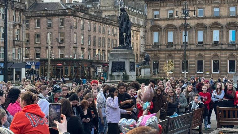 Fans gather at a vigil in St George's Square in Glasgow. Pic: PA