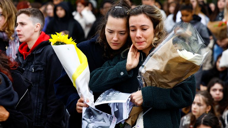 Teary Liam Payne fans in Paris on Sunday. Pic: PA