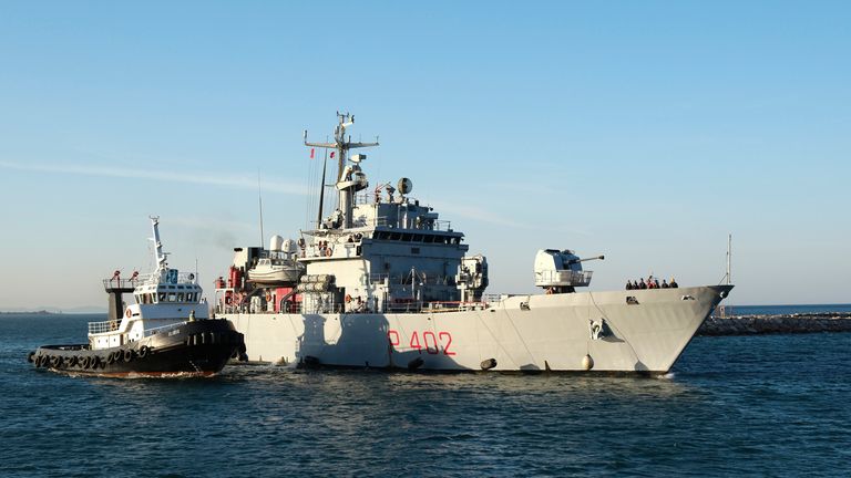 The Italian navy ship Libra arrives at the port of Shengjin northwestern Albania Wednesday, Oct. 16, 2024, carrying the first group of migrants who were intercepted in international waters  and redirected to Albania in force of an  agreement between the two counties. (AP Photo/Vlasov Sulaj)