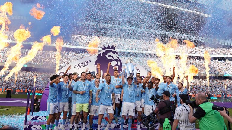 Man City celebrate after their win their fourth Premier League title in a row in May. Pic: AP