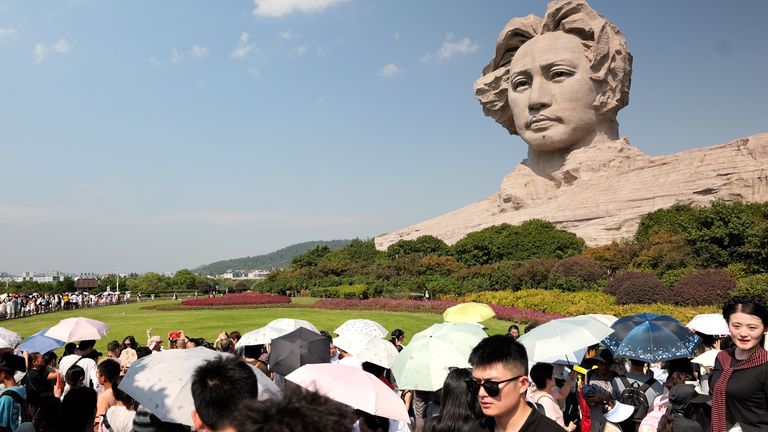 People gather at a statue of young Mao Zedong in his home province of Hunan ahead of China’s National Day  