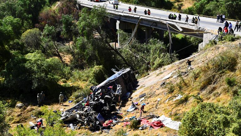 Authorities work on the site of the accident. Pic: Reuters