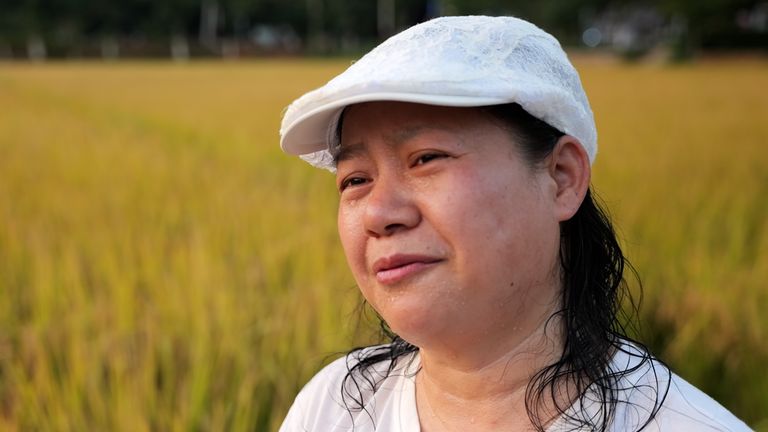 Mrs Zhou, who says she's afraid to get sick because life has become so expensive