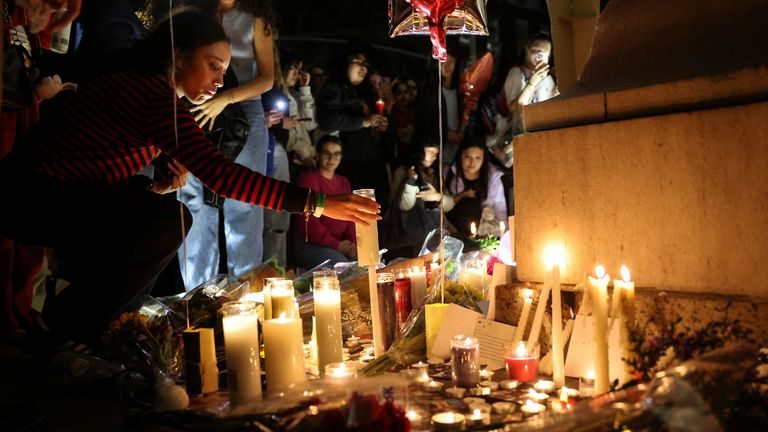 A candlelit vigil in Washington Square Park, New York City on Saturday. Pic: Reuters