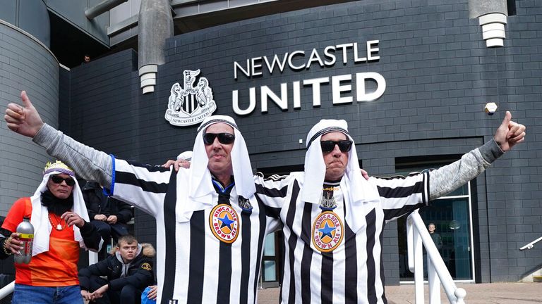 Newcastle United fans celebrate Saudi takeover in 2021. Photo: AP