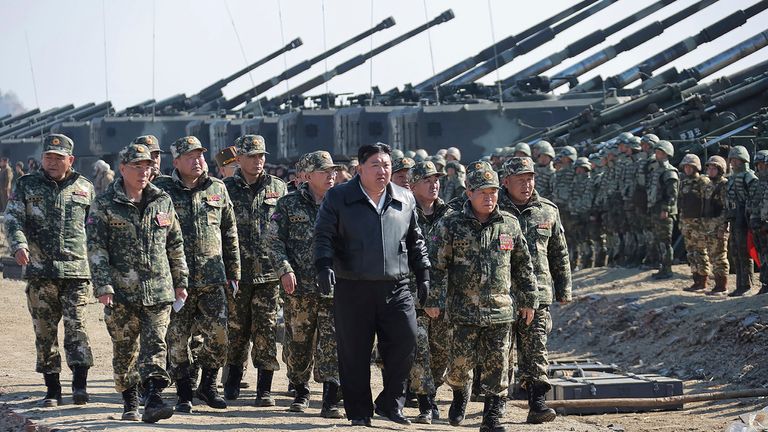 FILE - In this photo provided by the North Korean government, North Korean leader Kim Jong Un, center, supervises artillery firing drills in North Korea on March 7, 2024. (Korean Central News Agency/Korea News Service via AP, File)