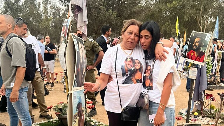 Israelis cry at the site of the Nova Music Festival massacre on 7 October 2024, a year after Hamas' attack on Israel