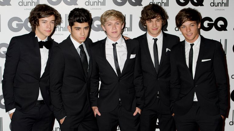 FILE -  One Direction's Liam Payne, second from right, poses for a photo with fellow band members Harry Styles, Zayn Malik, Niall Horan and Liam Tomlinson at the GQ Men of the Year Awards in London, Sept. 6, 2011. (AP Photo/Jonathan Short, File)