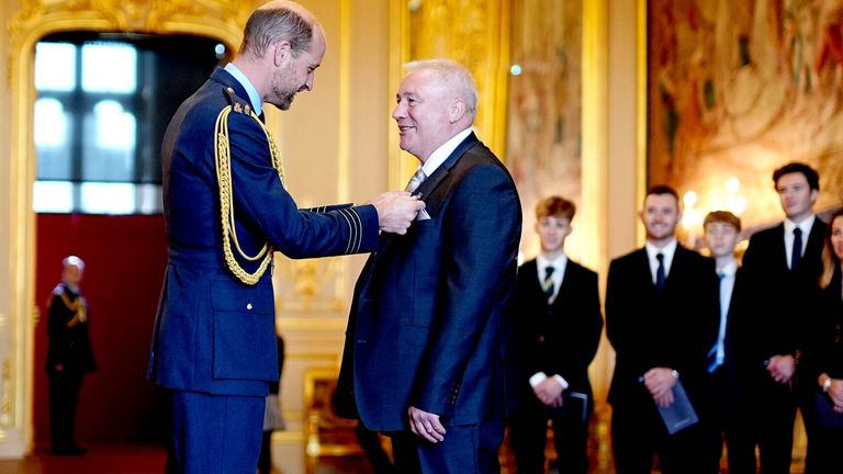 Ally McCoist is made an Officer of the Order of the British Empire by the Prince of Wales.
Pic: PA