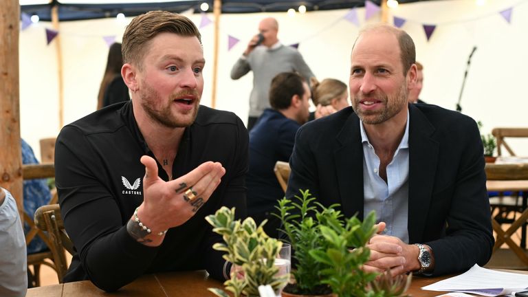 The Prince of Wales and British swimmer Adam Peaty (left) take part in a round table discussion during a visit to Birtley Community Pool in Birtley, Tyne and Wear, to celebrate its reopening and highlight the importance of having access to swimming. Picture date: Thursday October 3, 2024.