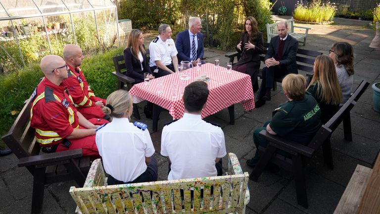 The Prince and Princess of Wales (top right) speak to members of the emergency services during a visit to Southport Community Centre.
Pic: PA