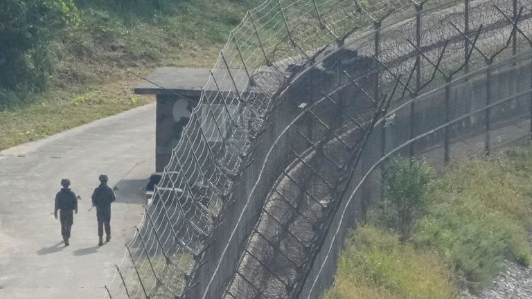 South Korean soldiers patrol the barbed wire fence in Paju, South Korea, near the border with North Korea, Thursday, Oct. 10, 2024. (AP Photo/Ahn Young-joon)