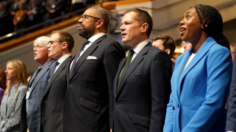 Tory leadership candidates, Tom Tugendhat (fourth right), James Cleverly (third right) Robert Jenrick (second right) and Kemi Badenoch sing the national anthem after delivering their speeches at the Conservative Party Conference at the International Convention Centre in Birmingham. Picture date: Wednesday October 2, 2024. PA Photo. See PA story POLITICS Tories. Photo credit should read: Jacob King/PA Wire