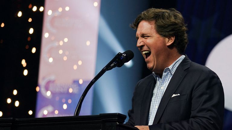 Tucker Carlson speaks at a campaign event for Republican presidential nominee and former U.S. President Donald Trump sponsored by conservative group Turning Point USA, in Duluth, Georgia, U.S., October 23, 2024. REUTERS/Elijah Nouvelage