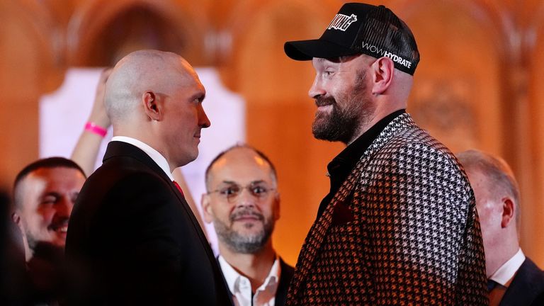 Tyson Fury (right) faces off against Oleksandr Usyk during a press conference at the Guildhall, London. Picture date: Wednesday October 23, 2024.