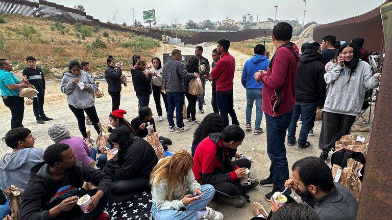 Migrants..seeking asylum remainder  arsenic  they hold   to beryllium  processed aft  crossing the borderline  Wednesday, June 5, 2024, successful  San Diego, Calif. President Joe Biden has unveiled plans to enact contiguous  important    restrictions connected  migrants seeking asylum astatine  the U.S.-Mexico borderline  arsenic  the White House tries to neutralize migration  arsenic  a governmental  liability up  of the November elections. (AP Photo/Eugene Garcia)