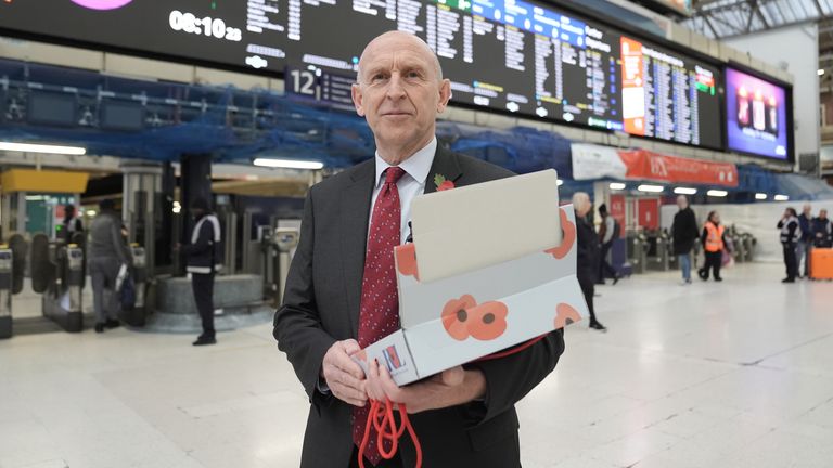 John Healey joins serving military personnel to hand out poppies and collect donations for the Royal British Legion Appeal at Victoria Station.
Pic: PA