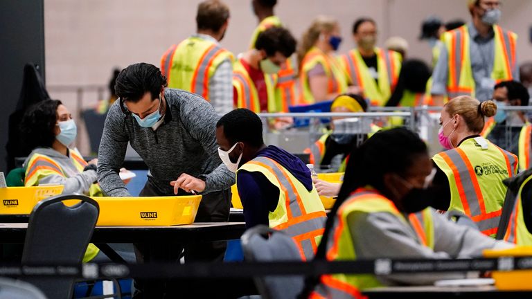 Mail-in and absentee ballots being counted in Pennsylvania in 2020. Pic: AP