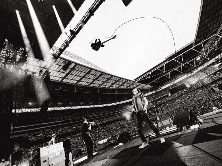 Tom Pallant's shot of Graham Coxon's sky-high guitar over Blur's show at Wembley picked up the music moment of the year prize at the Abbey Road Music Photography Awards