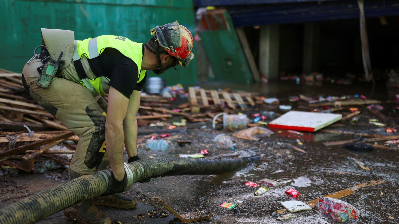 Spanish authorities search flooded underground car park - fearing how ...