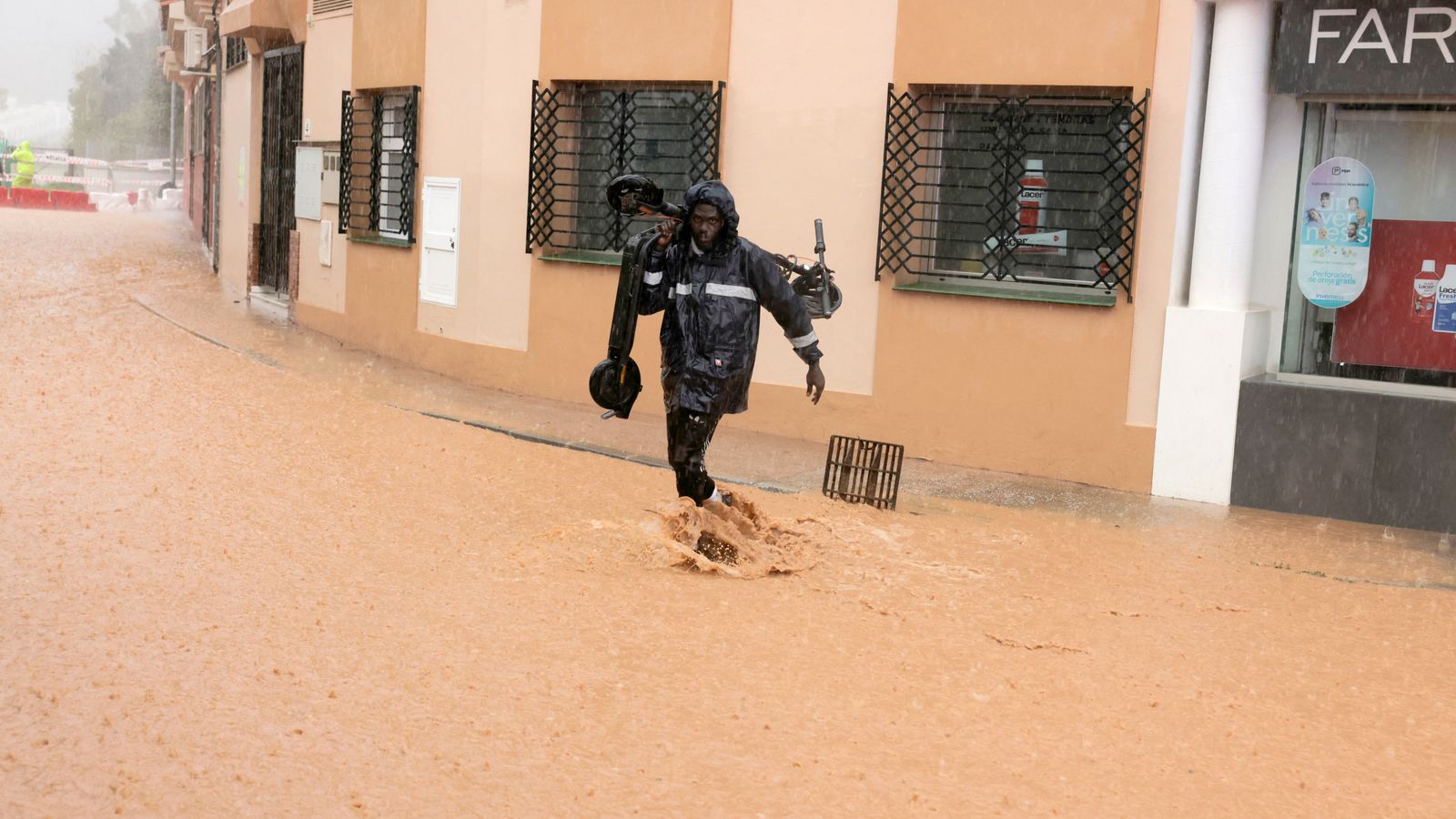 Thousands evacuated in Spain as residents cover cars in plastic wrap ...