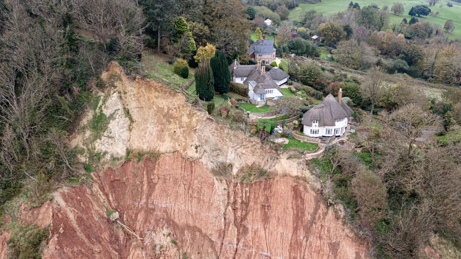 Cottage left teetering on cliff edge after massive Jurassic Coast landslip