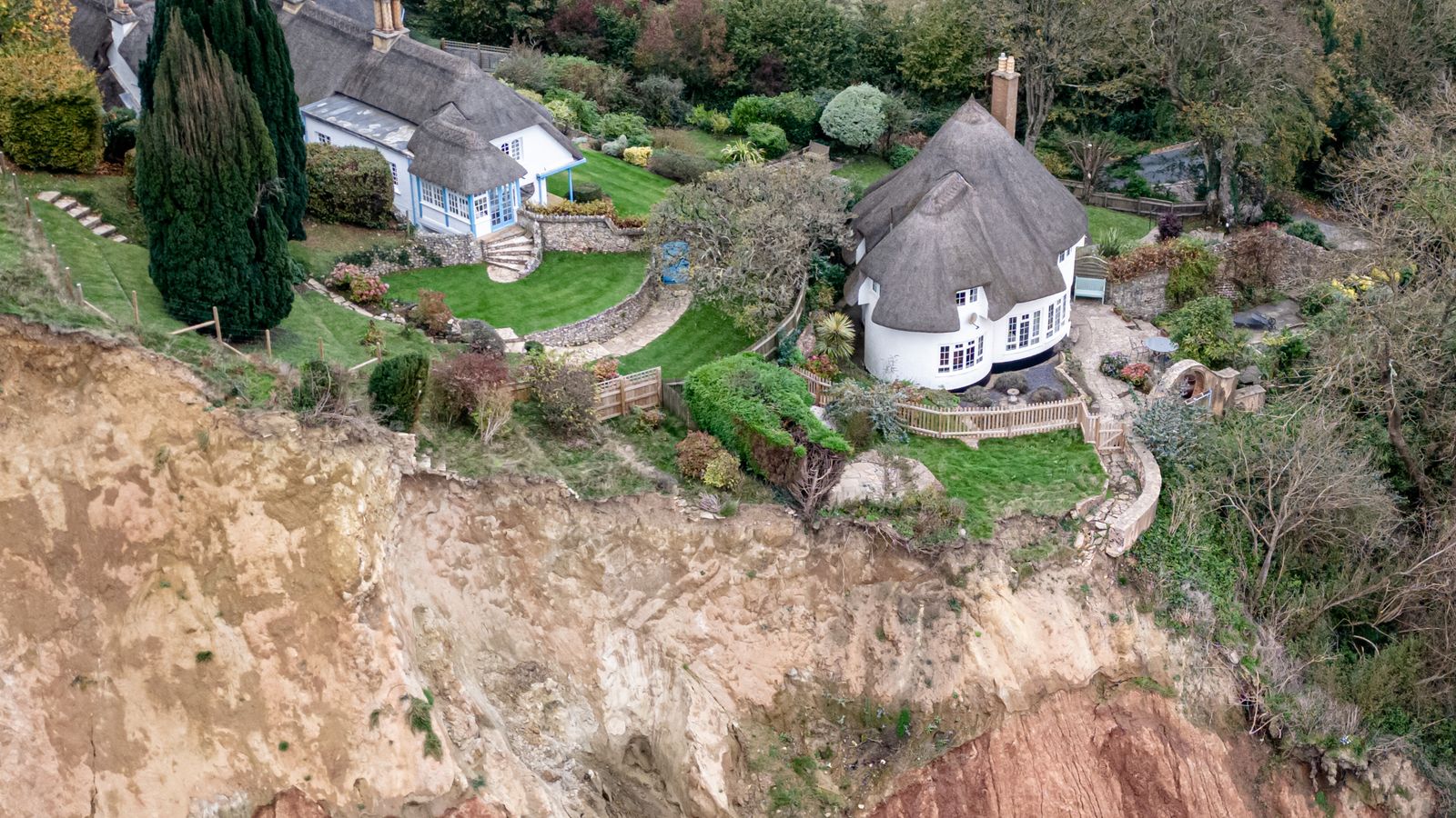 Cottage left teetering on cliff edge after massive Jurassic Coast ...