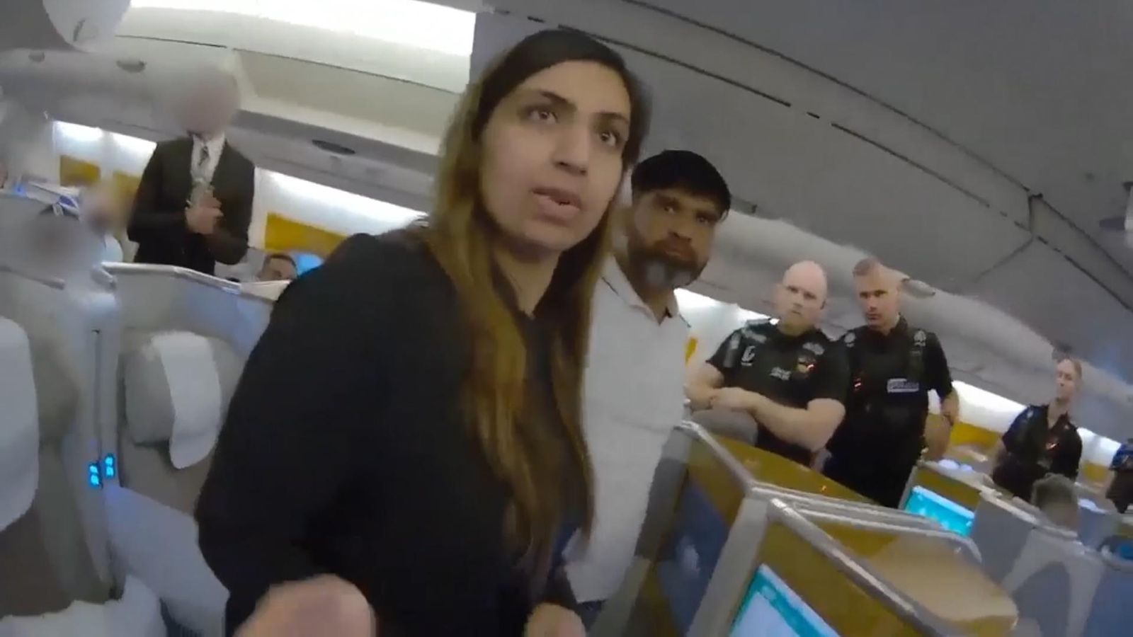 'I think you're looking for us': Video shows moment Sara Sharif's family detained on plane