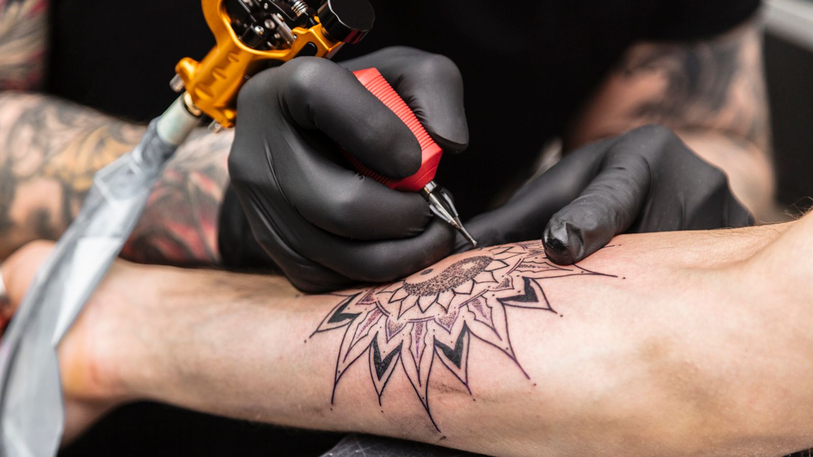 Wales brings in new rules for tattoo artists and body piercers with UK-first licensing scheme