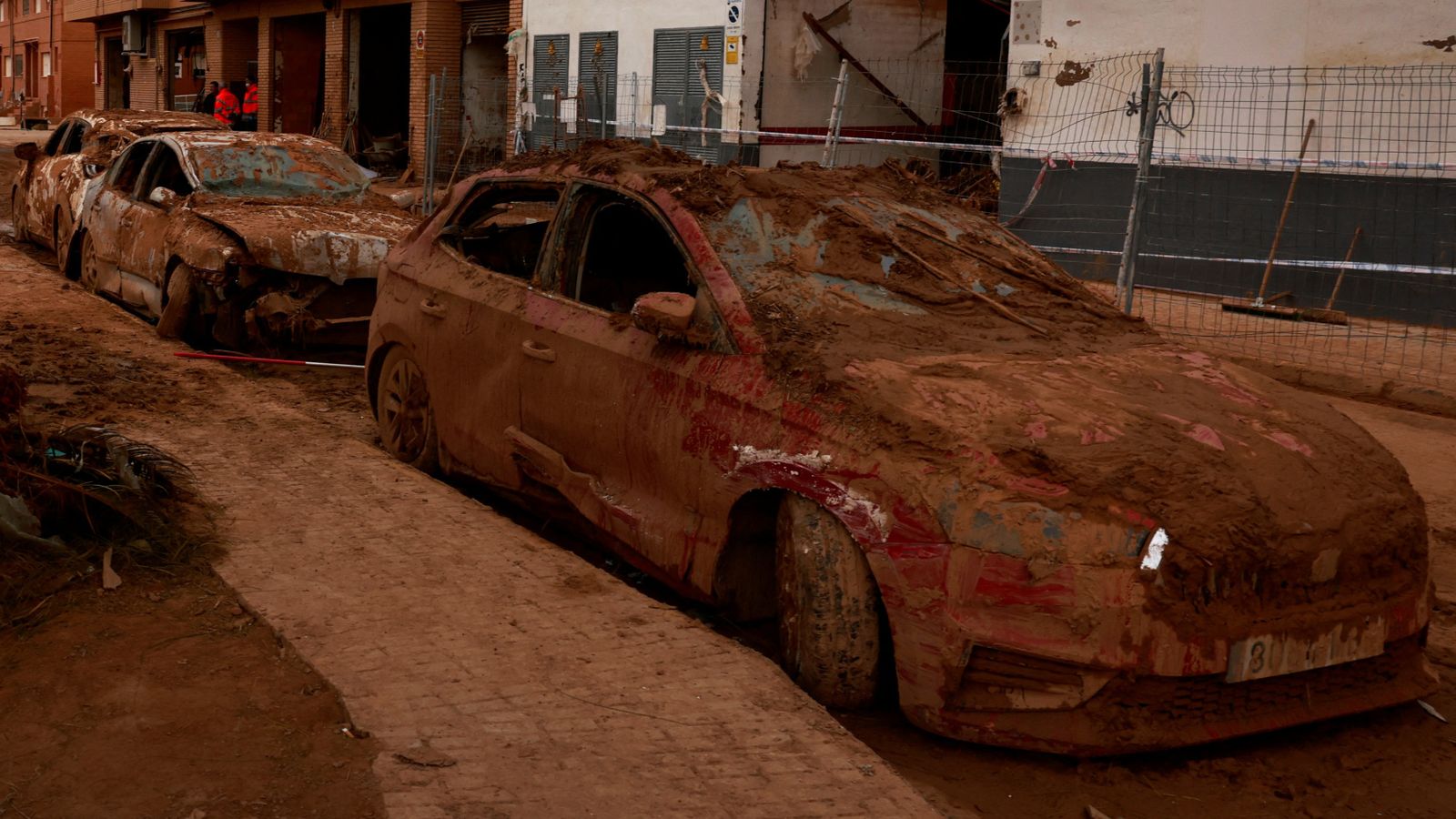 Cars ‘covered in plastic wrap’ in Spain as weather warnings issued ahead of storm