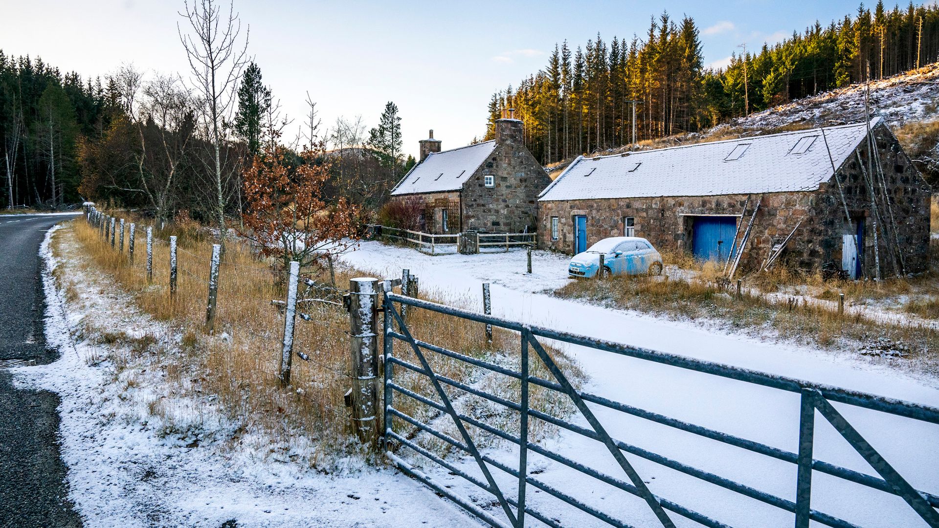 First amber health alert issued as snow falls across parts of UK after coldest night of the season