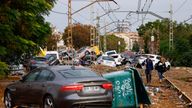 Abandoned cars pile up on railway tracks after flooding in Alfafar, Valencia. Pic: Reuters